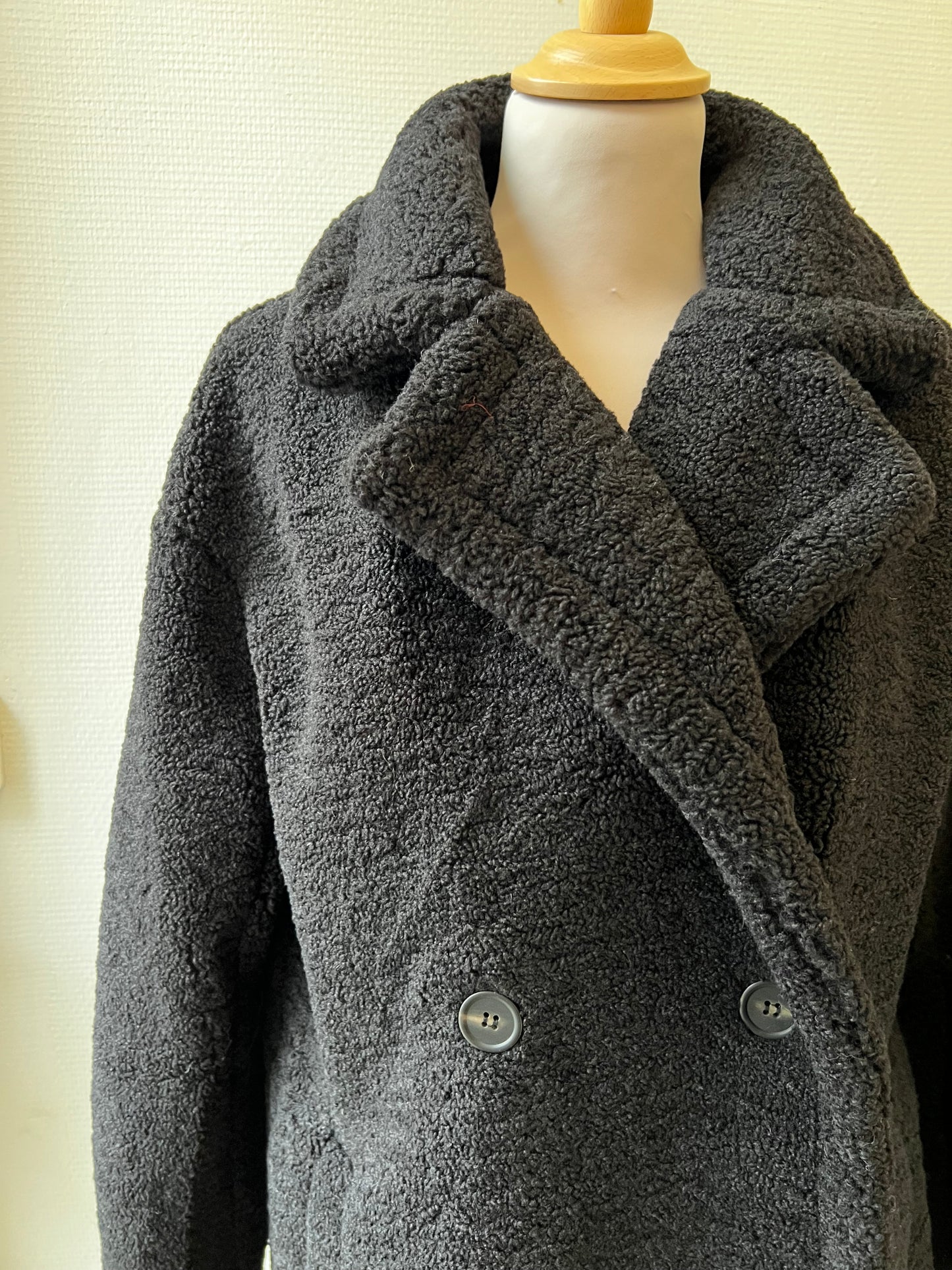 Manteau fausse fourrure noir